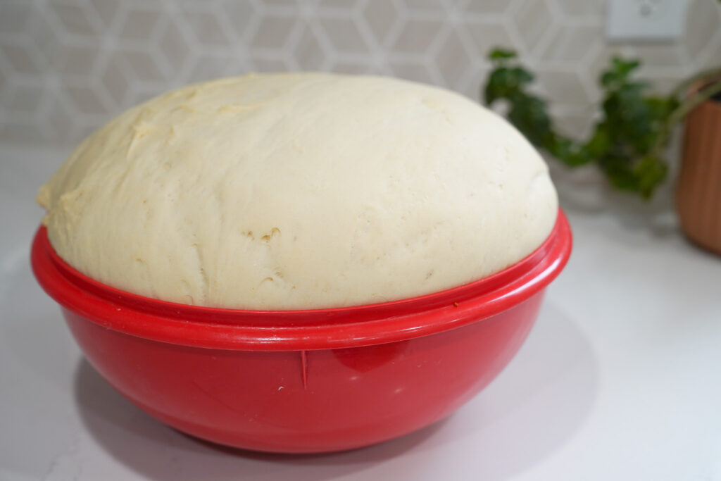 Roll dough after it has risen and doubled in size 