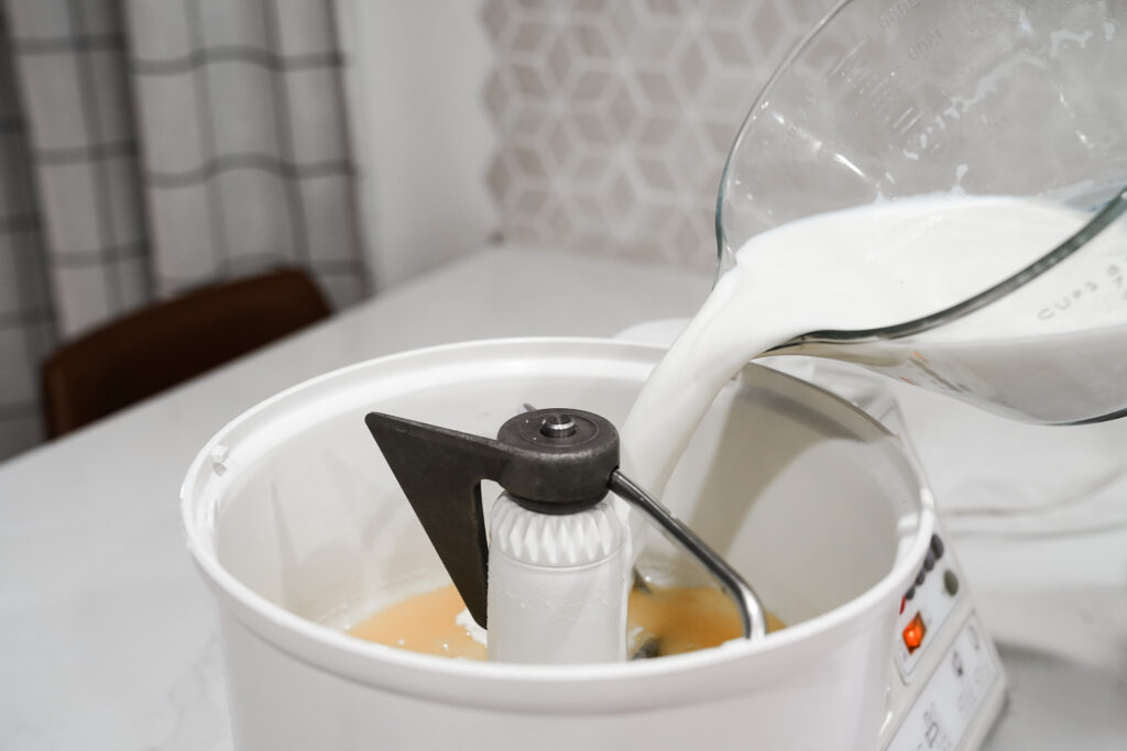 Pouring milk into a Bosch mixer